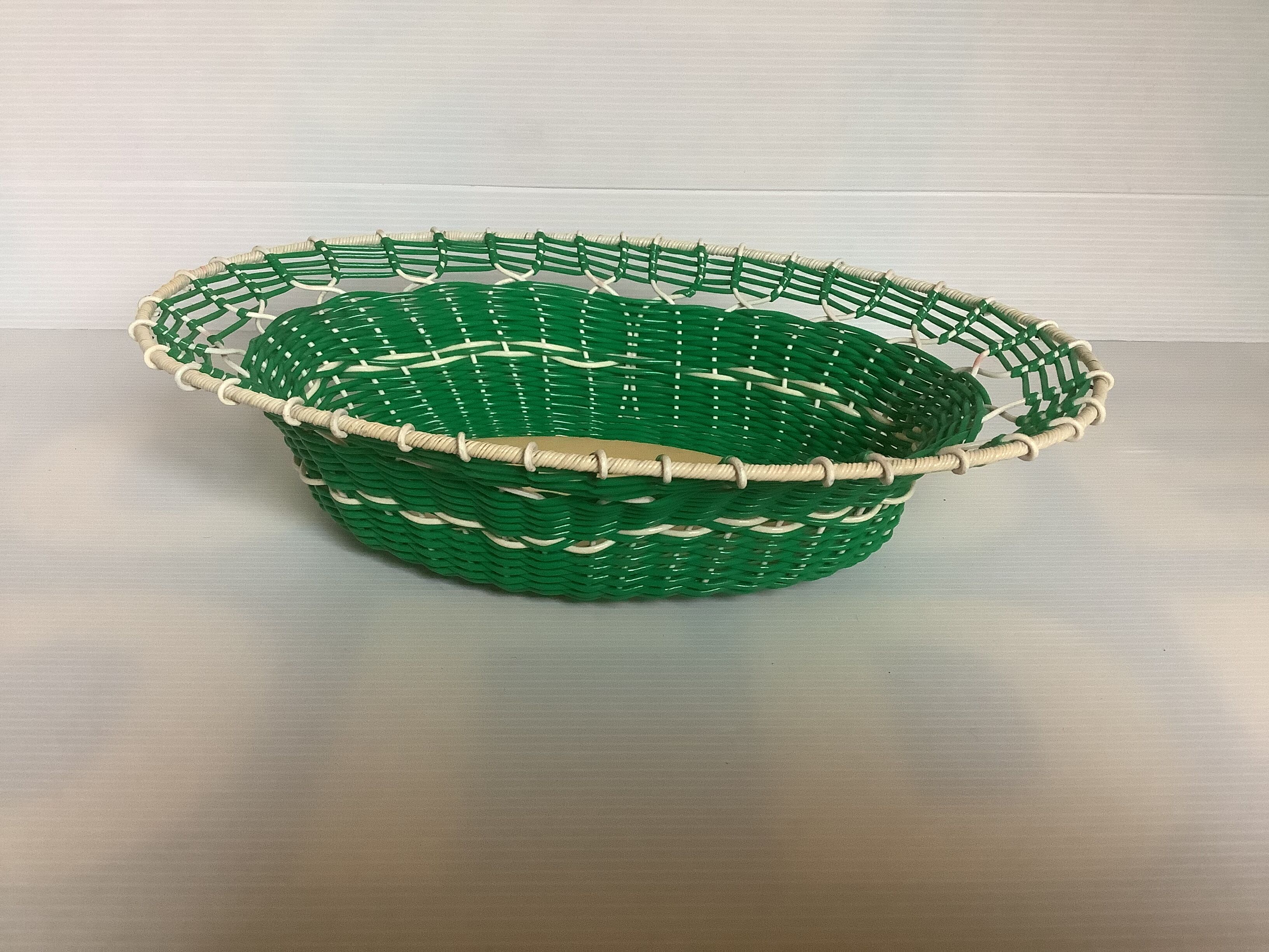 Old green scoubidou basket