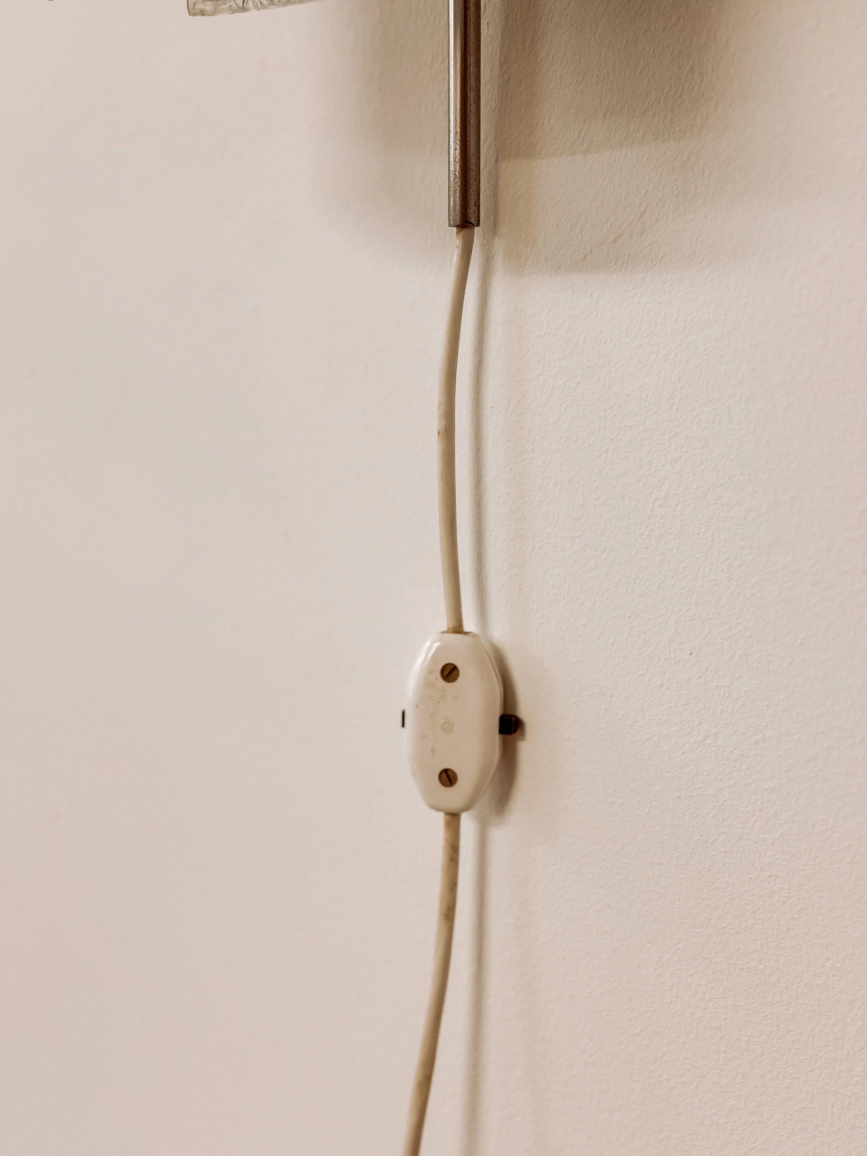 Mid-Century wall-mounted sconce in glass, 1960s
