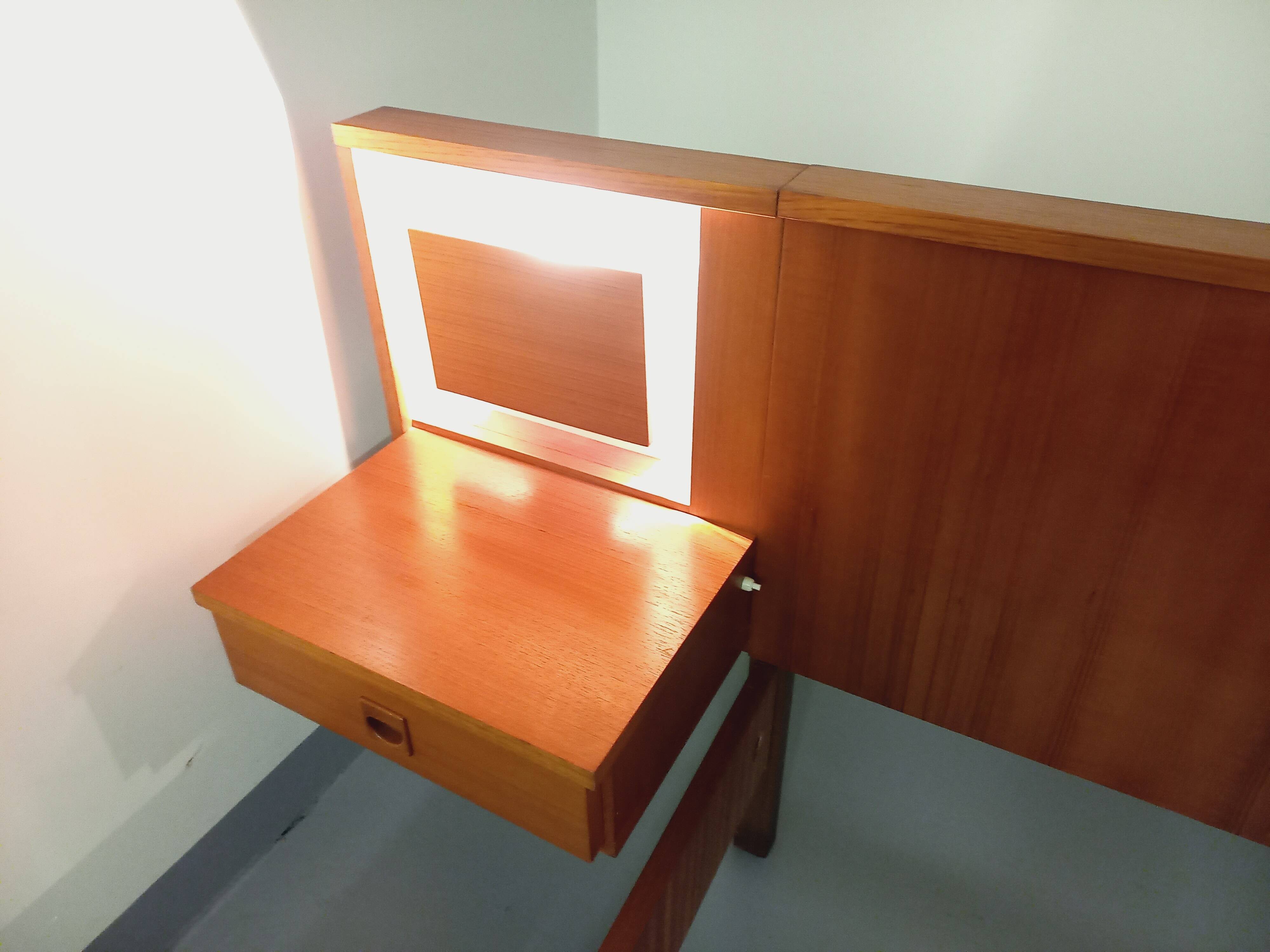 Vintage Scandinavian style double bed in teak from the 60s with integrated bedside lights