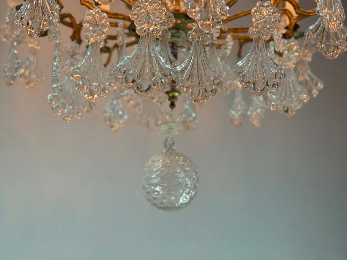 Gilt bronze cage chandelier decorated with glass pendants in the shape of peacock feathers circa 1800