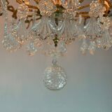 Gilt bronze cage chandelier decorated with glass pendants in the shape of peacock feathers circa 1800