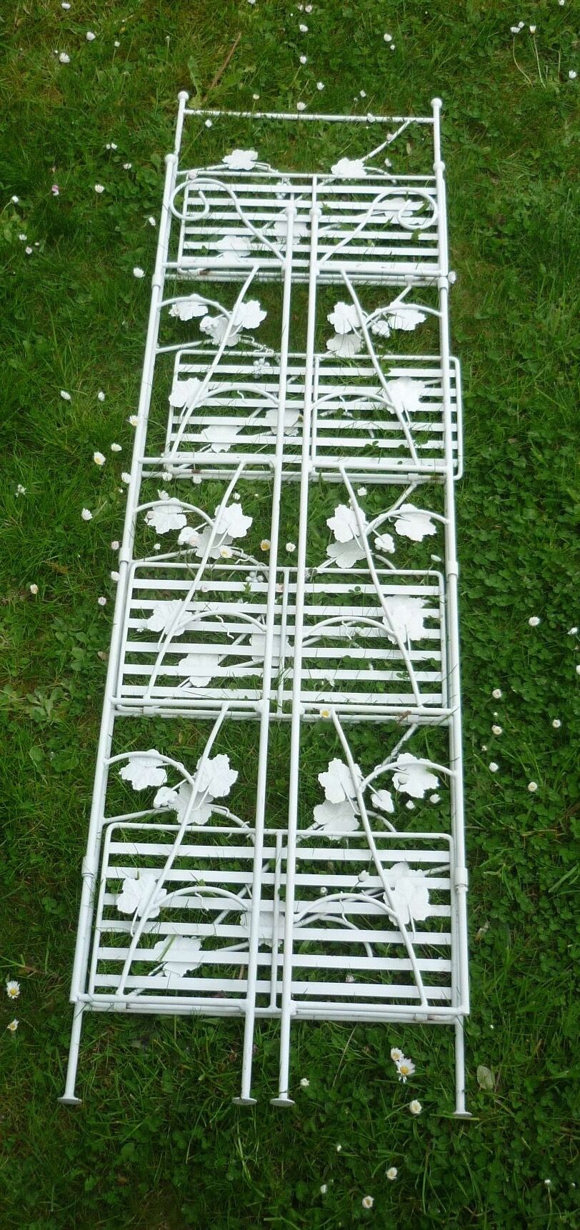 Folding white wrought iron shelf