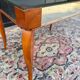 Small wooden coffee table with a mirror from the 1950s.