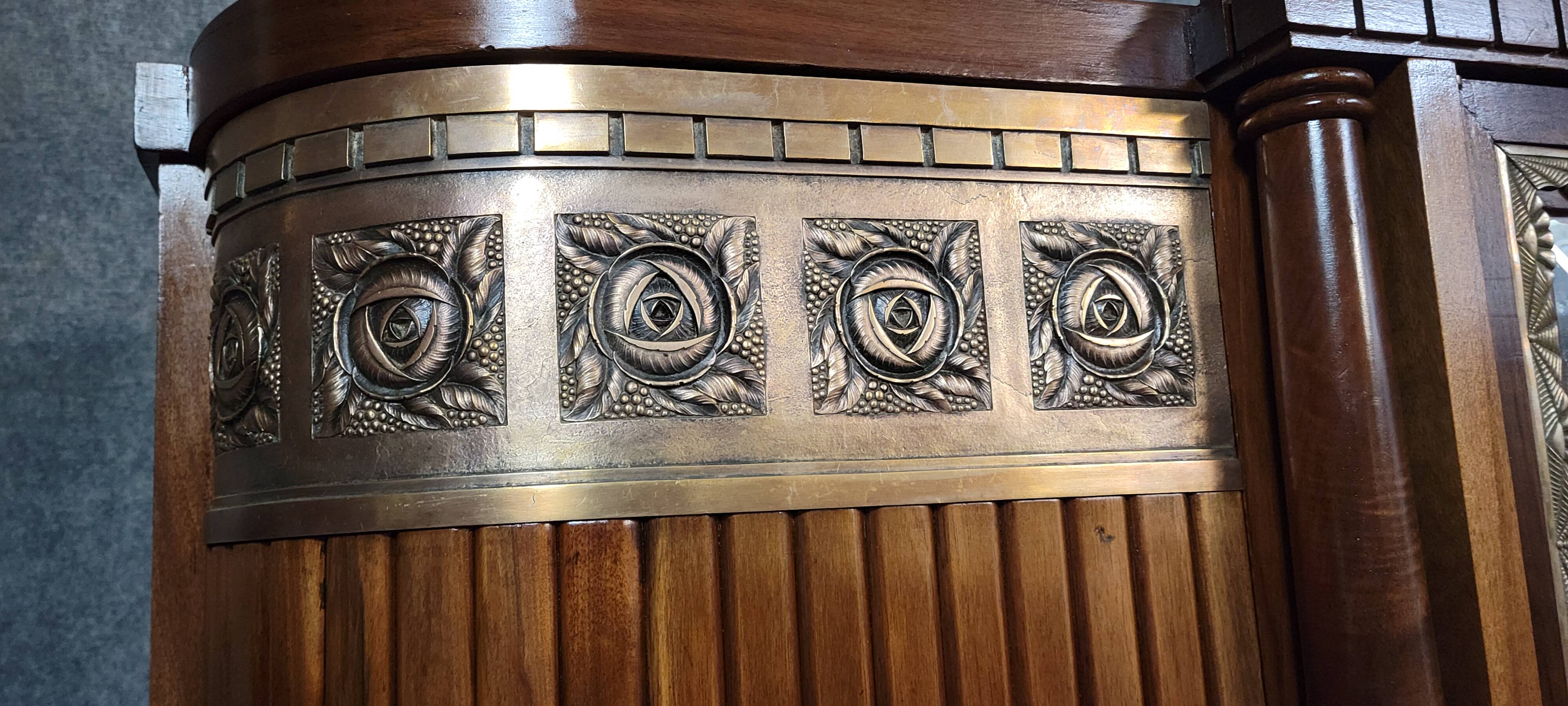 Large Art Deco bookcase wardrobe in mahogany and bronze.