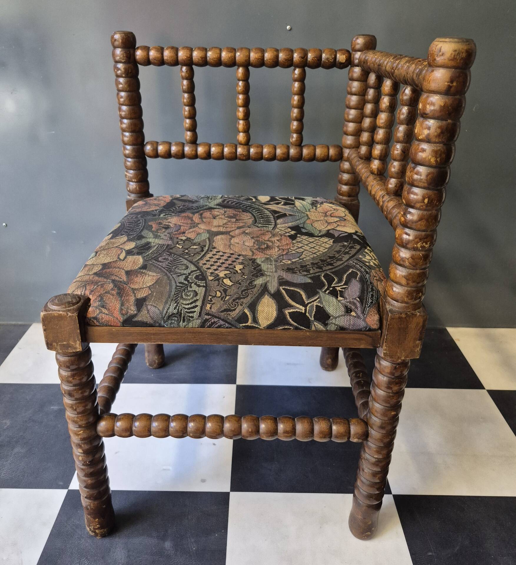 Old pair of corner chairs known as 'fireplace corner' armchairs.