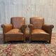 Paire de fauteuils Club en imitation cuir