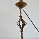 Large "Arts & Crafts" style lamp in beaten iron with a golden patina.