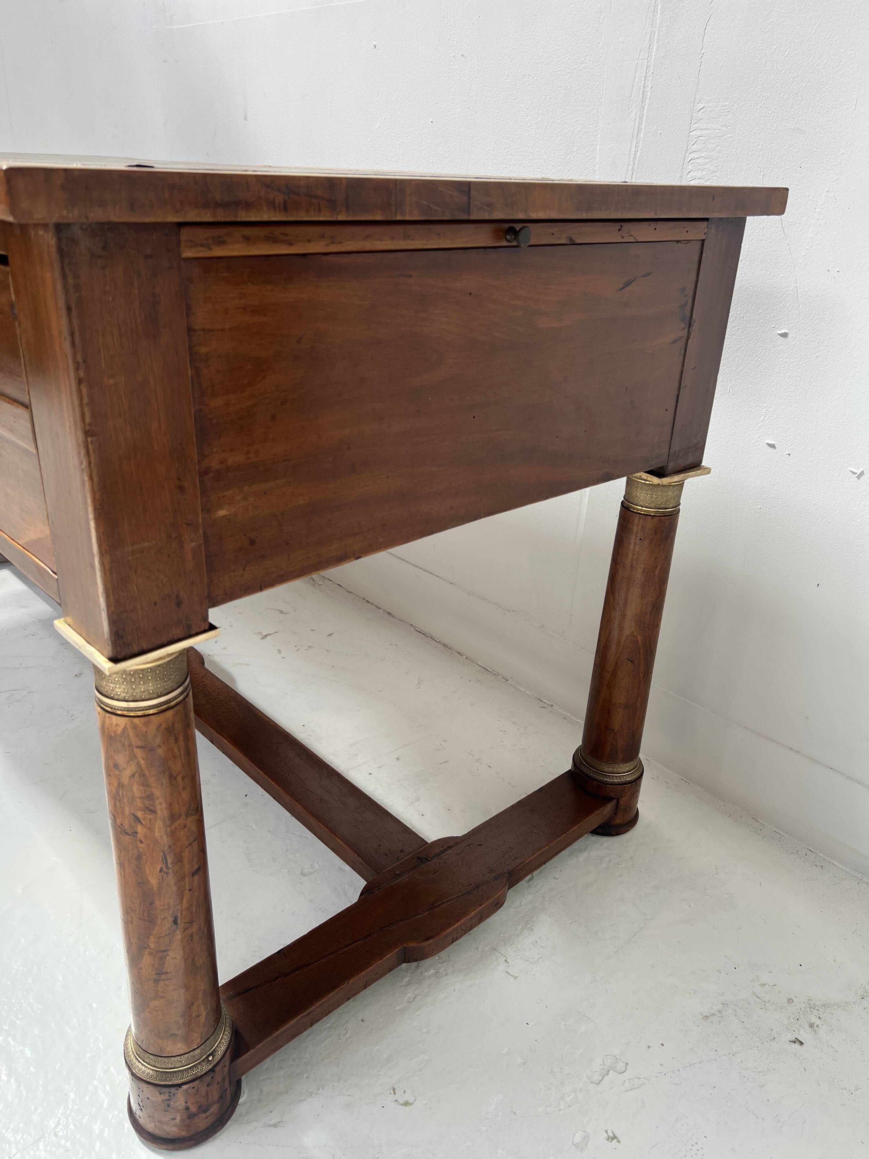 Empire style desk in mahogany and veneer, 19th century.