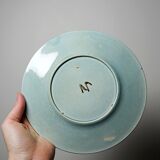 Polychrome slipware dessert plate, with a floral decoration, early 20th century.