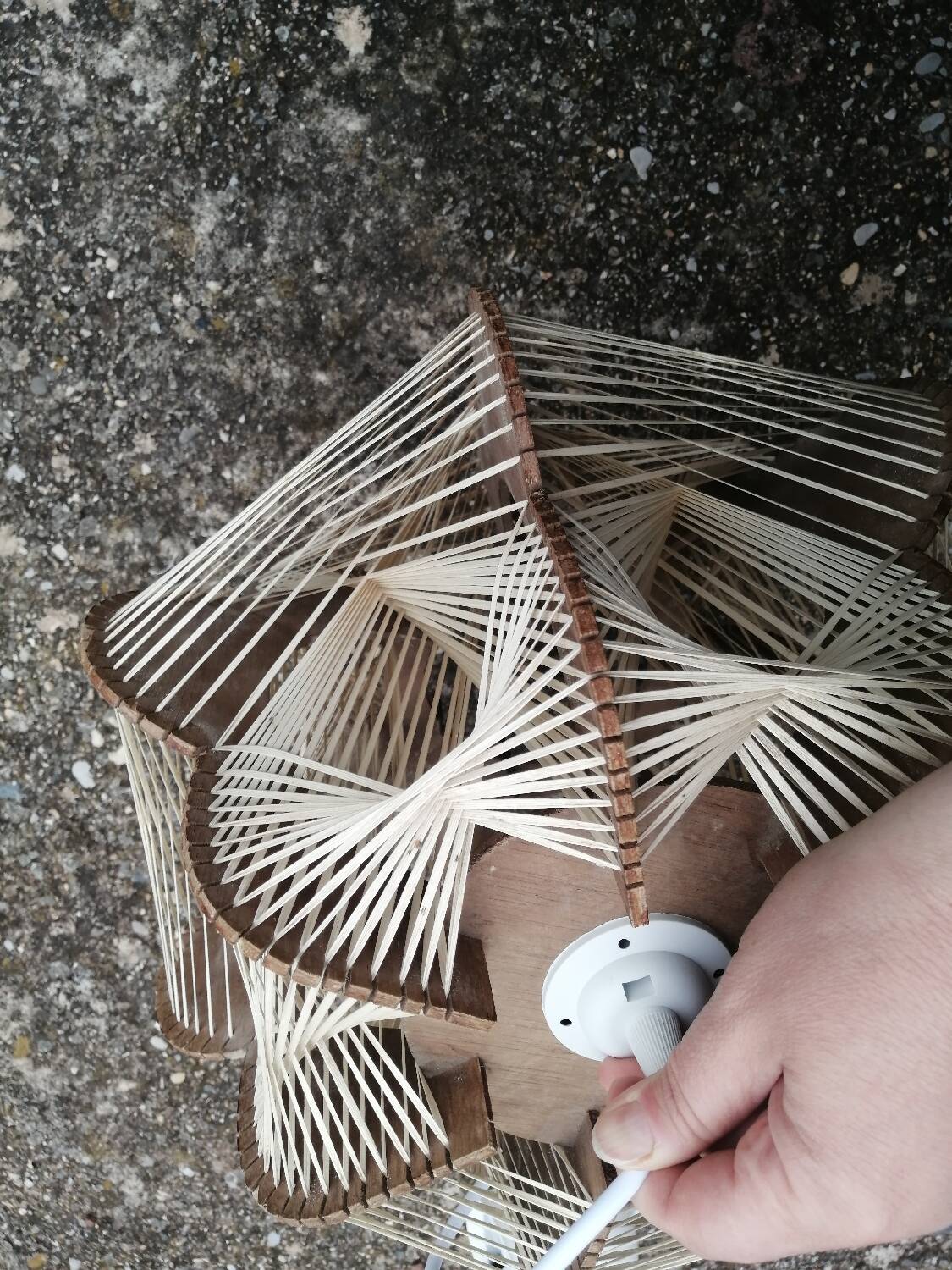 Pair of vintage wooden and rattan straw pendant lights.