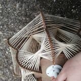 Pair of vintage wooden and rattan straw pendant lights.