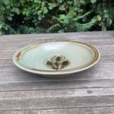 Large hollow serving plate in stoneware from the Blanot pottery.