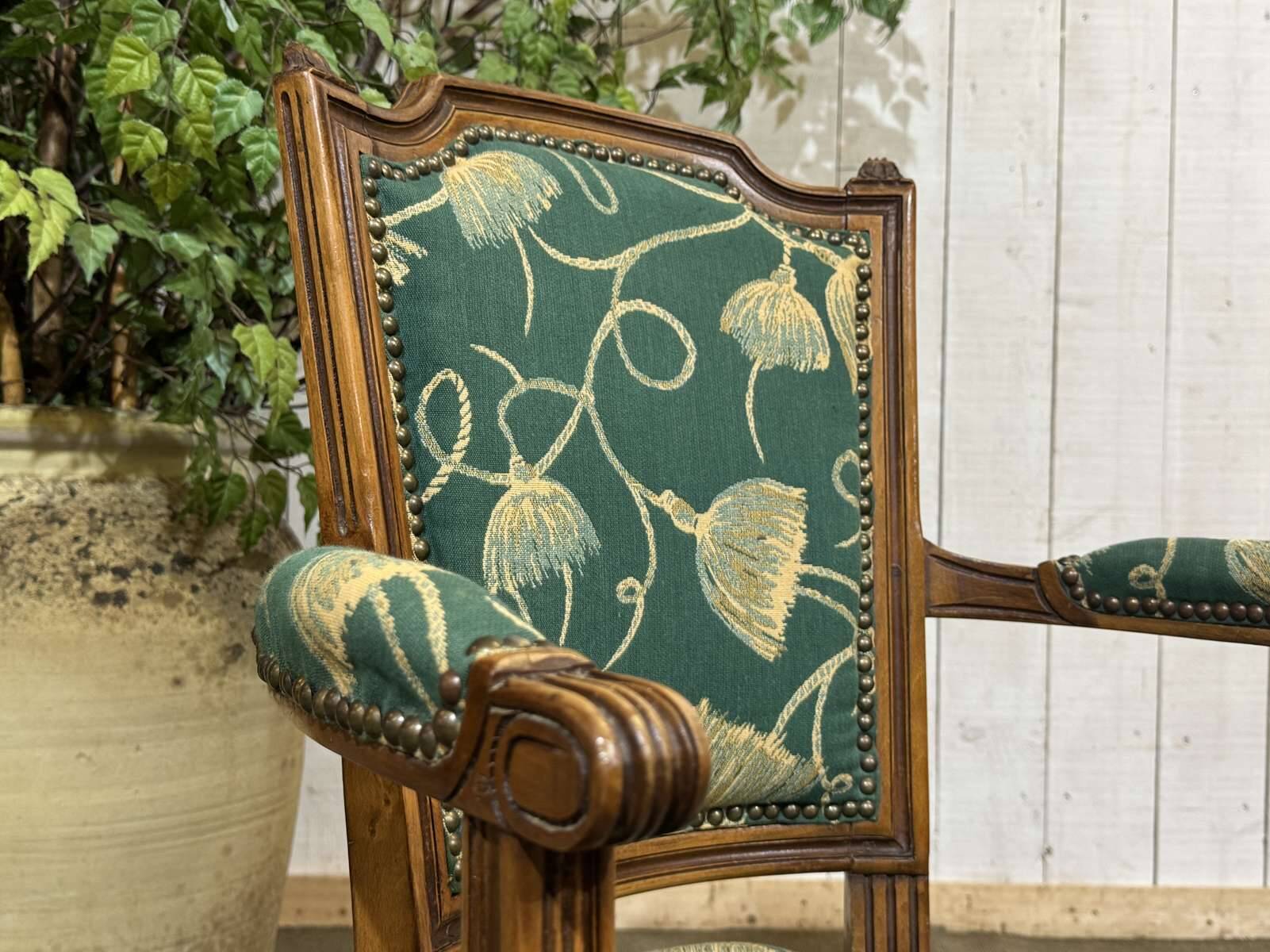 Pair of Louis XVI style armchairs in beech from the 19th century.