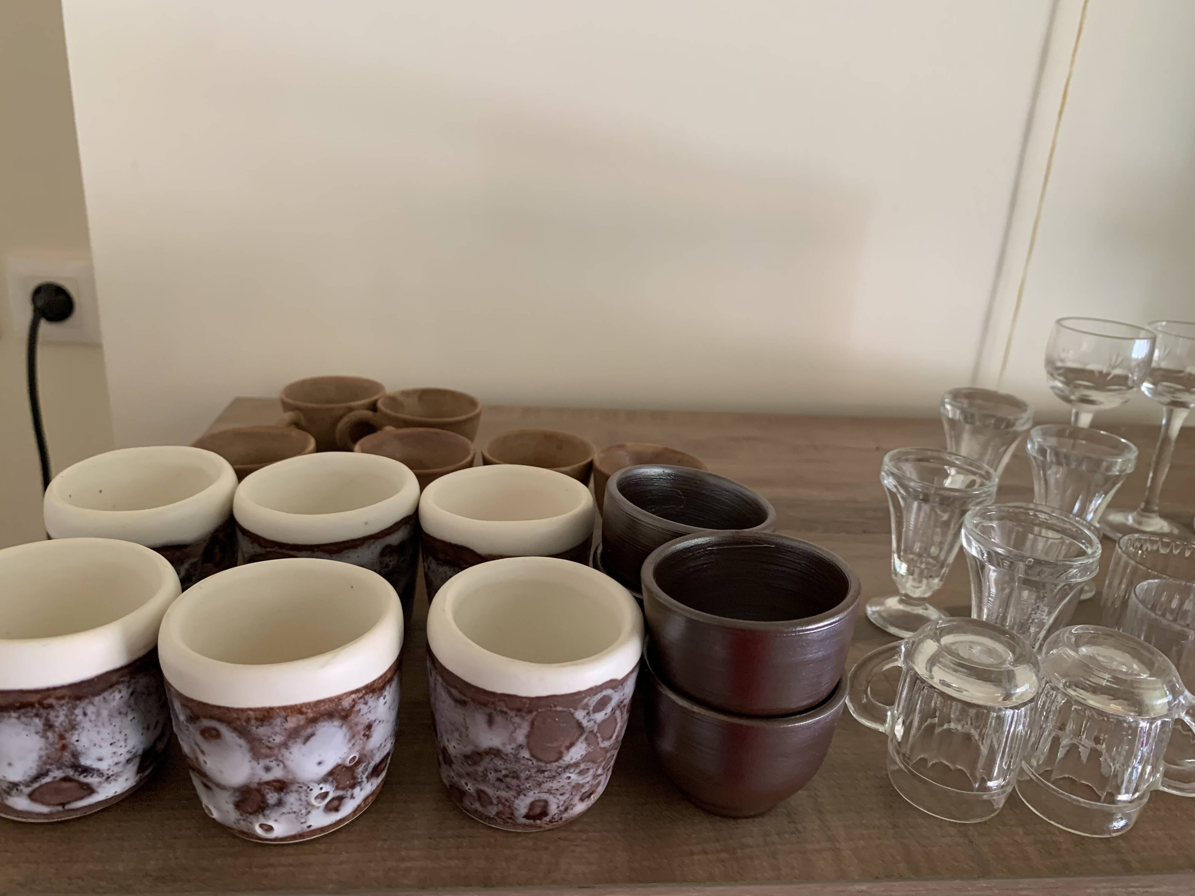 Set of 21 small liqueur glasses and 16 small cups and ramekins.