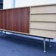 Midcentury sideboard with brass legs