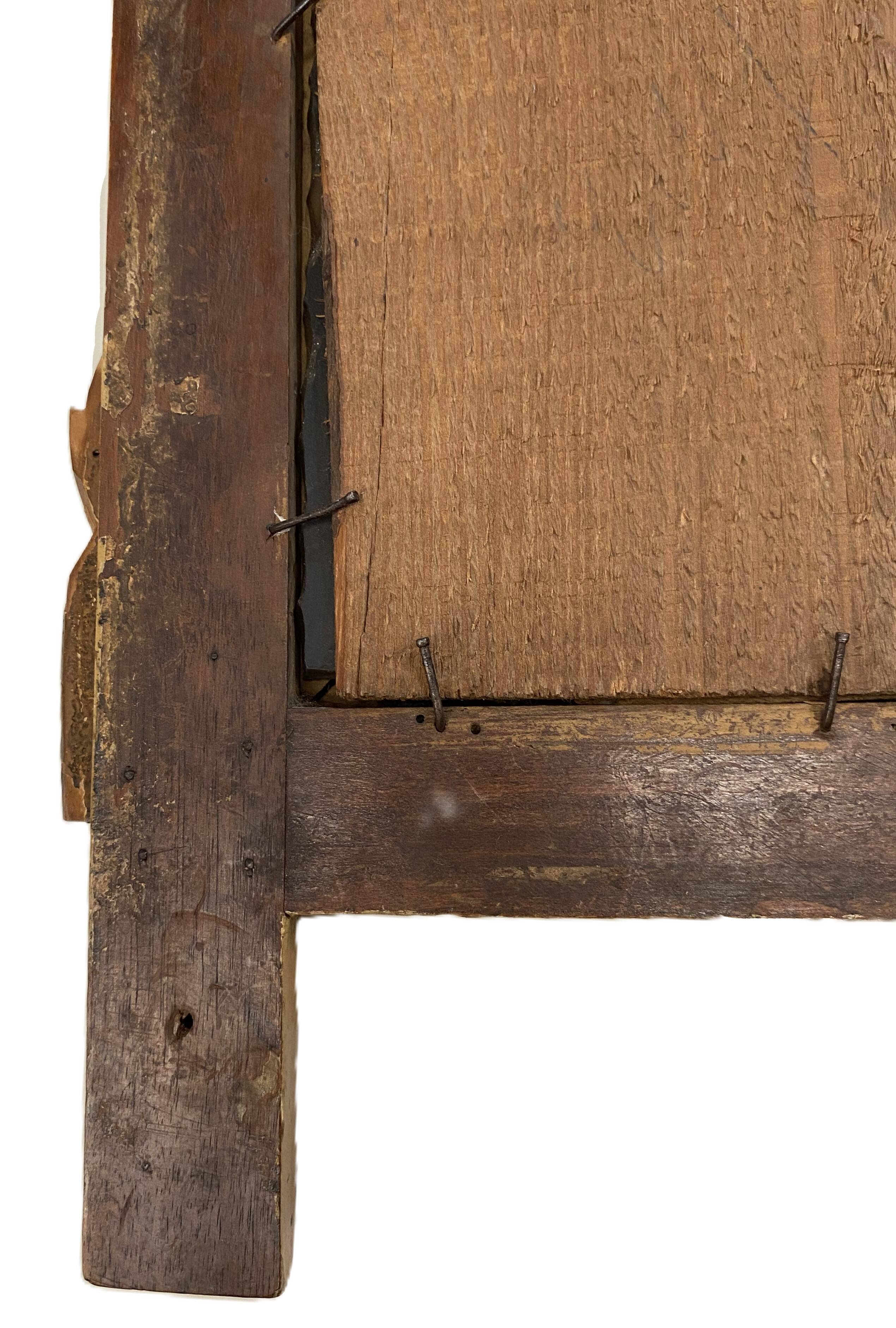 Petit miroir de dame Louis XVI en bois sculpté et doré