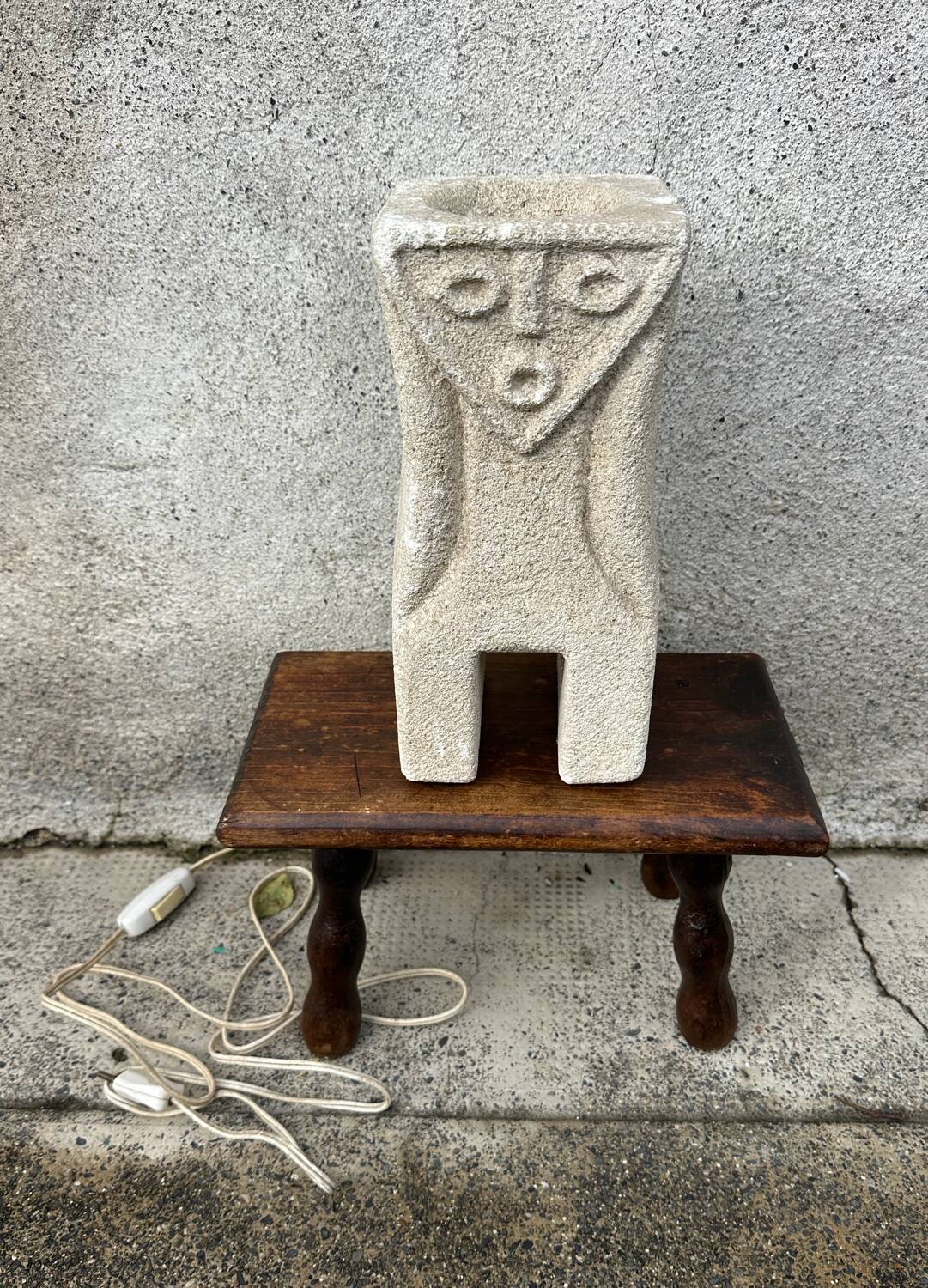 Anthropomorphic stone table lamp brutalised by Albert Tormos.