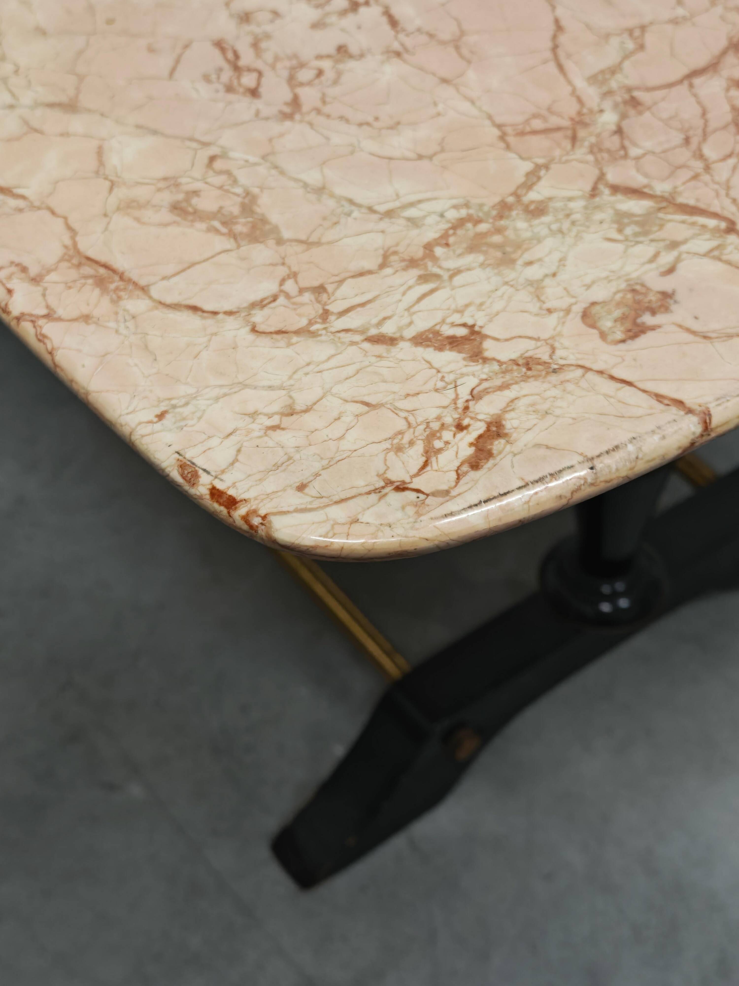 Mid-century modern coffee table in marble, brass, and wood, 1950s.