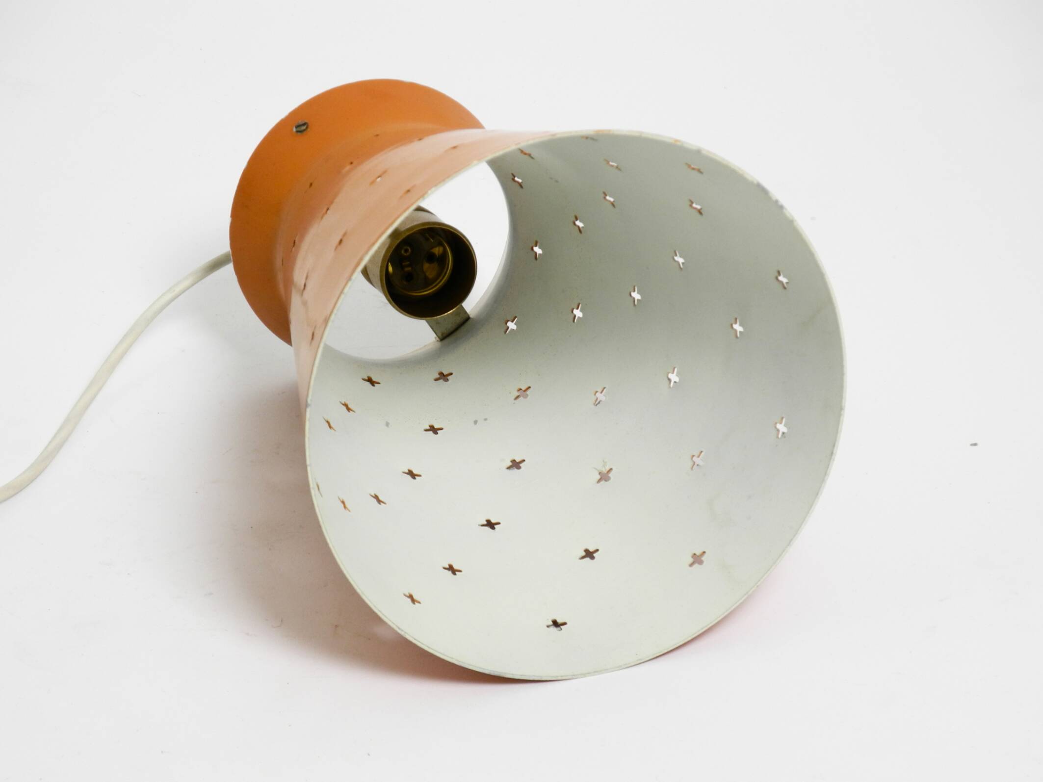 Beautiful Mid Century Modern Diabolo perforated metal sheet pendant lamp