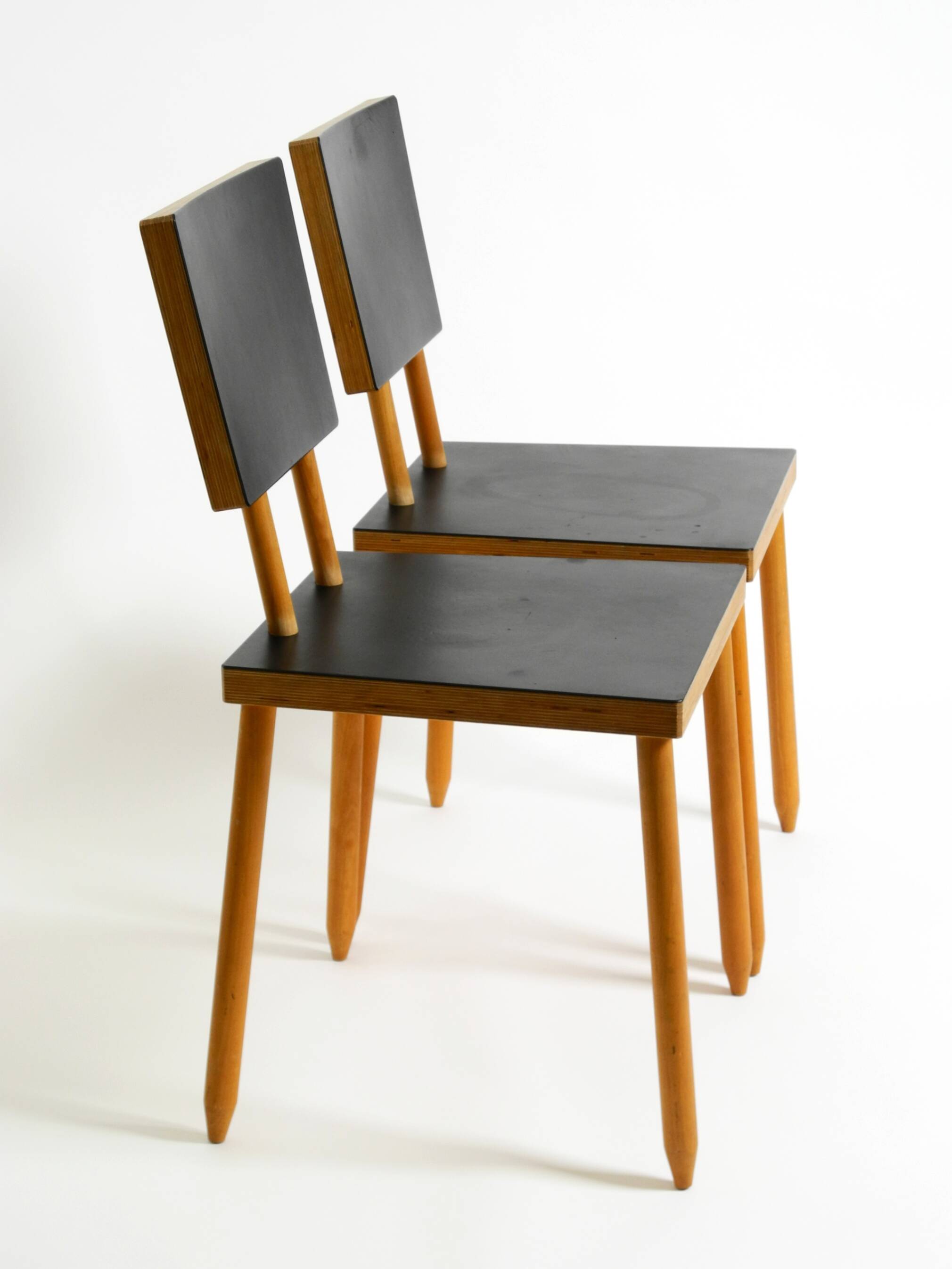 Two rare demountable plywood chairs by Axel Kufus model Stöcke for Atoll