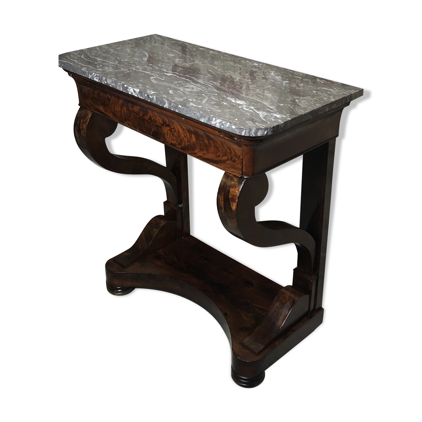 Console era restoration in mahogany veneer with St. Anne marble top.