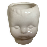 Baby doll shaped vase planter