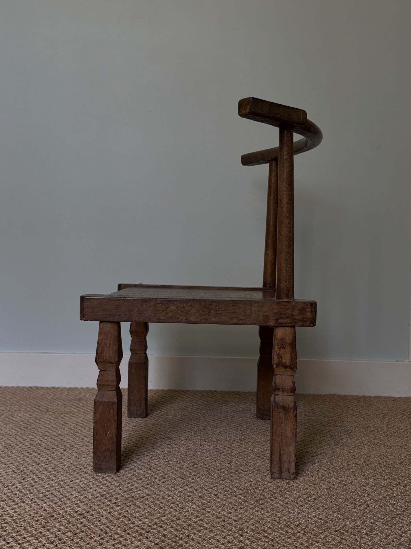 Handcrafted low chair in solid wood – Ivory Coast