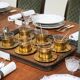 Mid-century tea service in patinated brass and glass