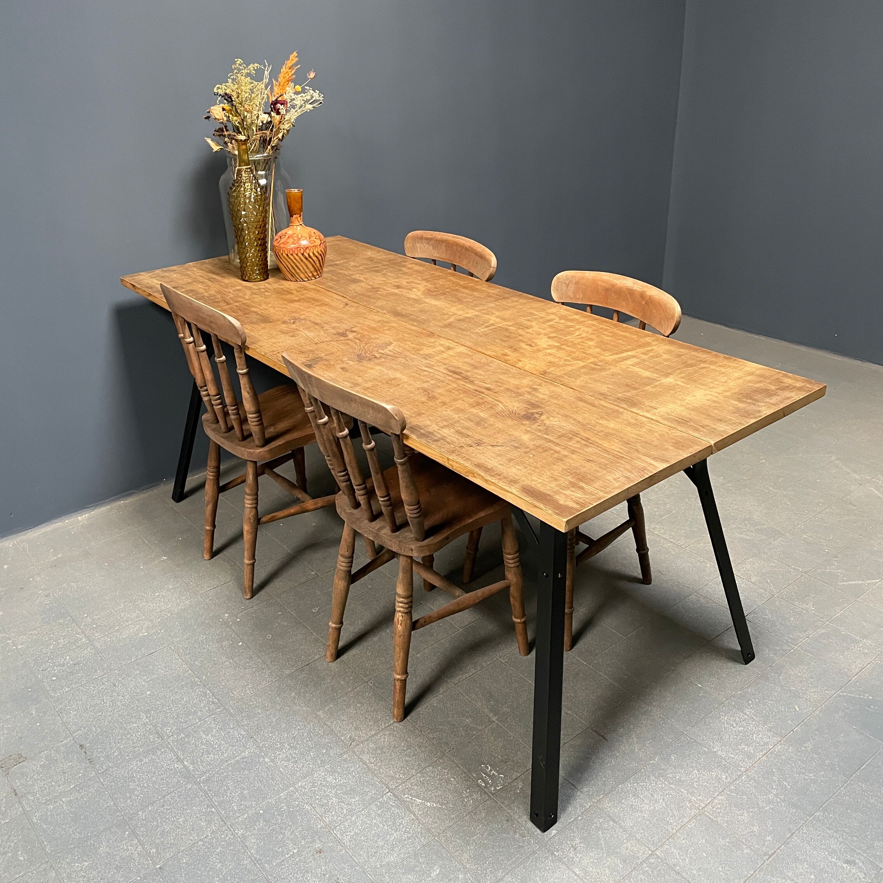 Handmade industrial oak dining table with black metal legs