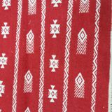 Handmade red and white carpet
