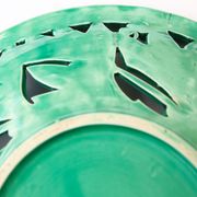 Openwork XL dish in green slurry like olive branches