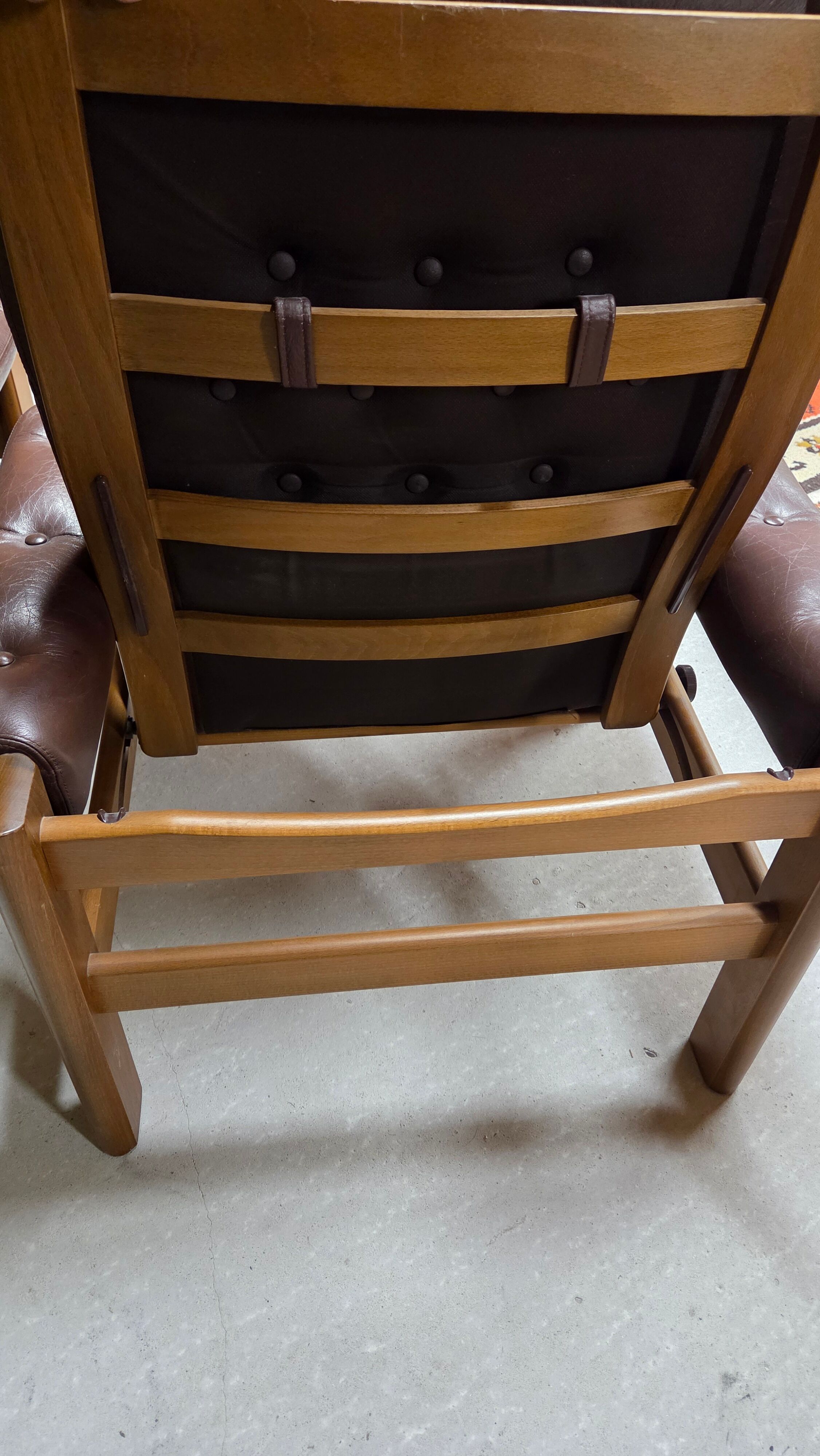 Pair of leather armchairs and an ottoman, Sweden 1970.