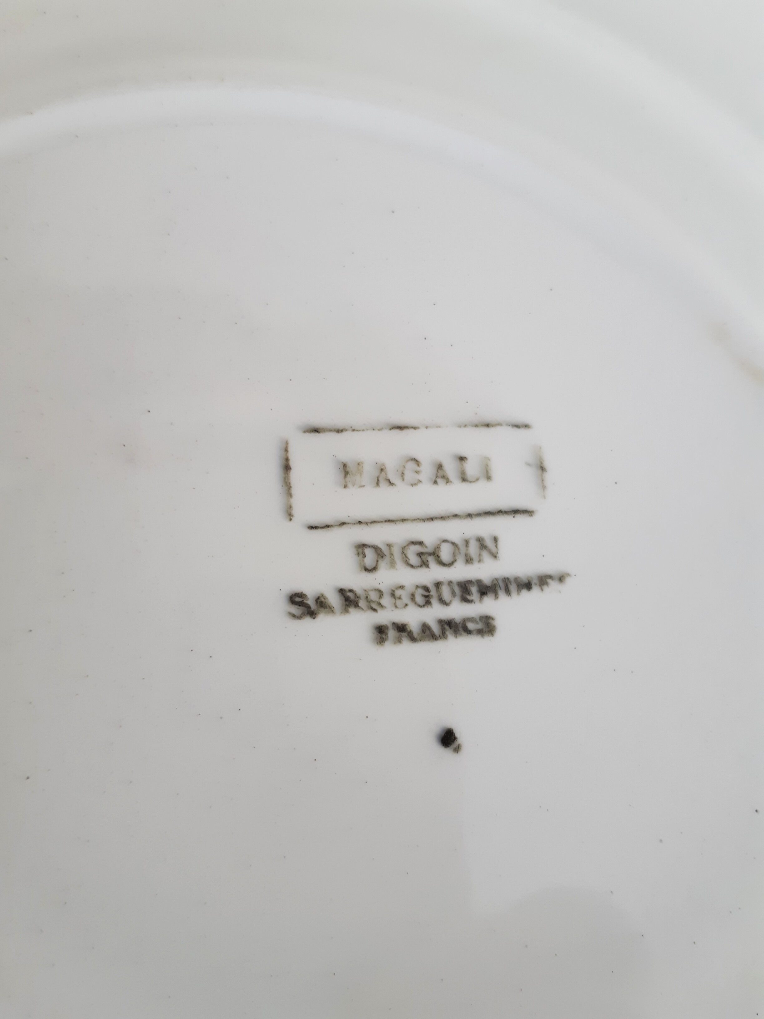 Flat earthenware plates from Sarreguemines , Magali from Digoin