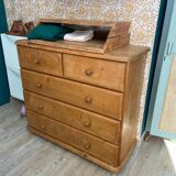 Wooden chest of drawers with changing table