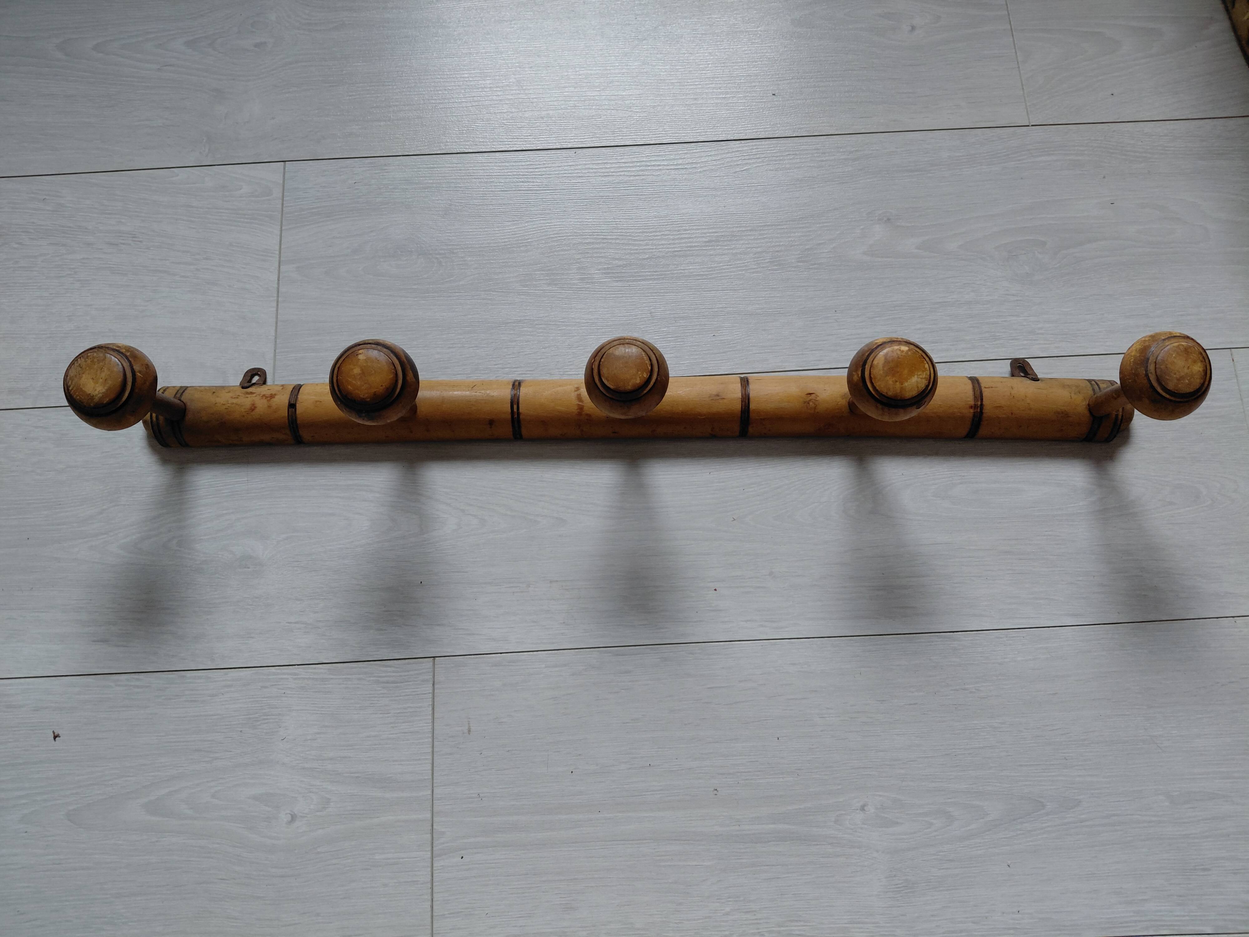 Wooden wall coat rack