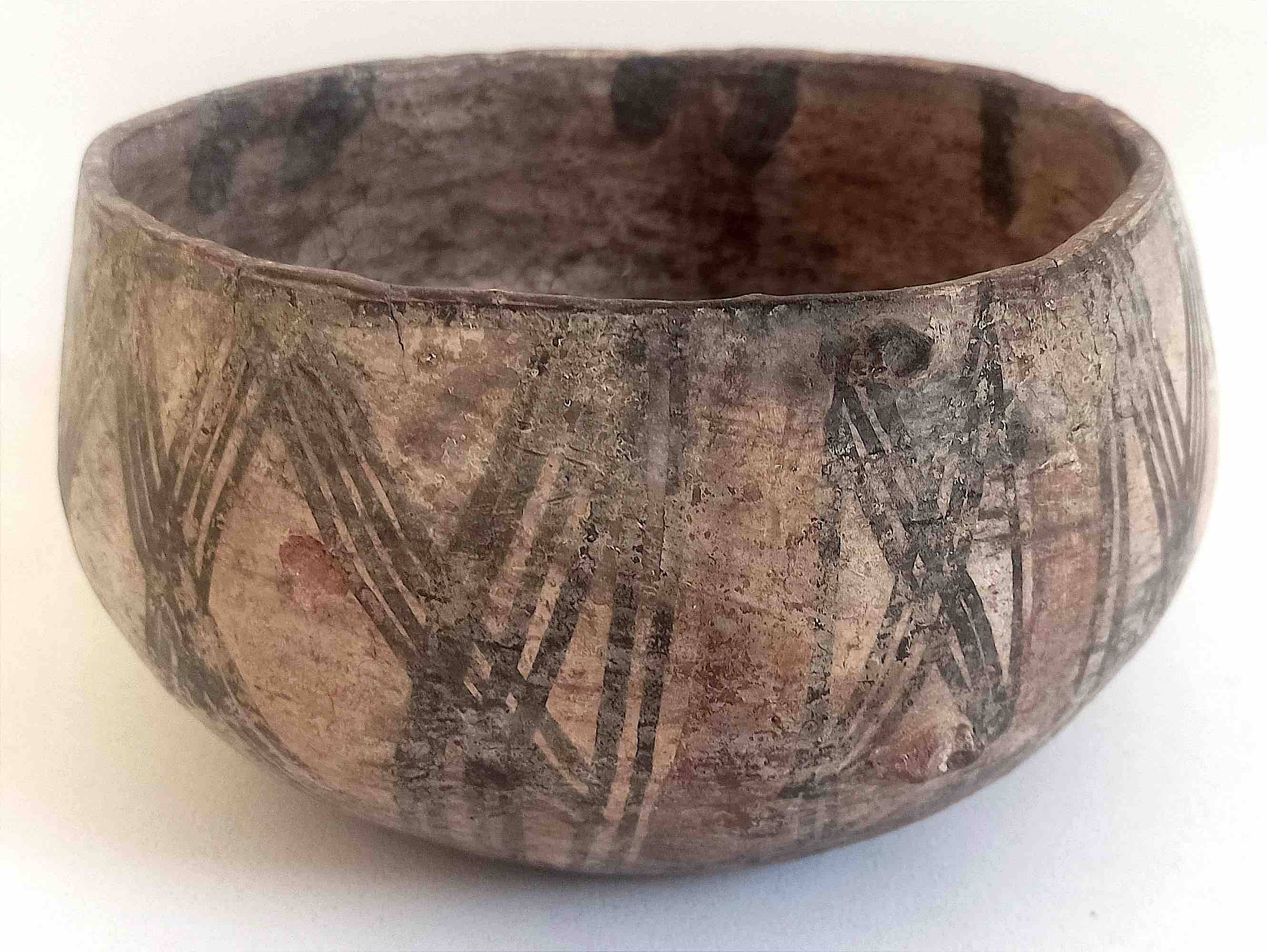 Large ethnic style bowl in orange terracotta, early 20th century