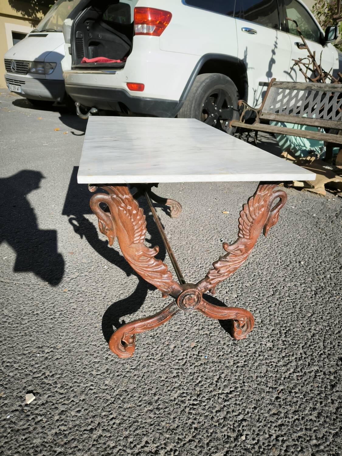 Cast iron and marble swan-neck coffee table