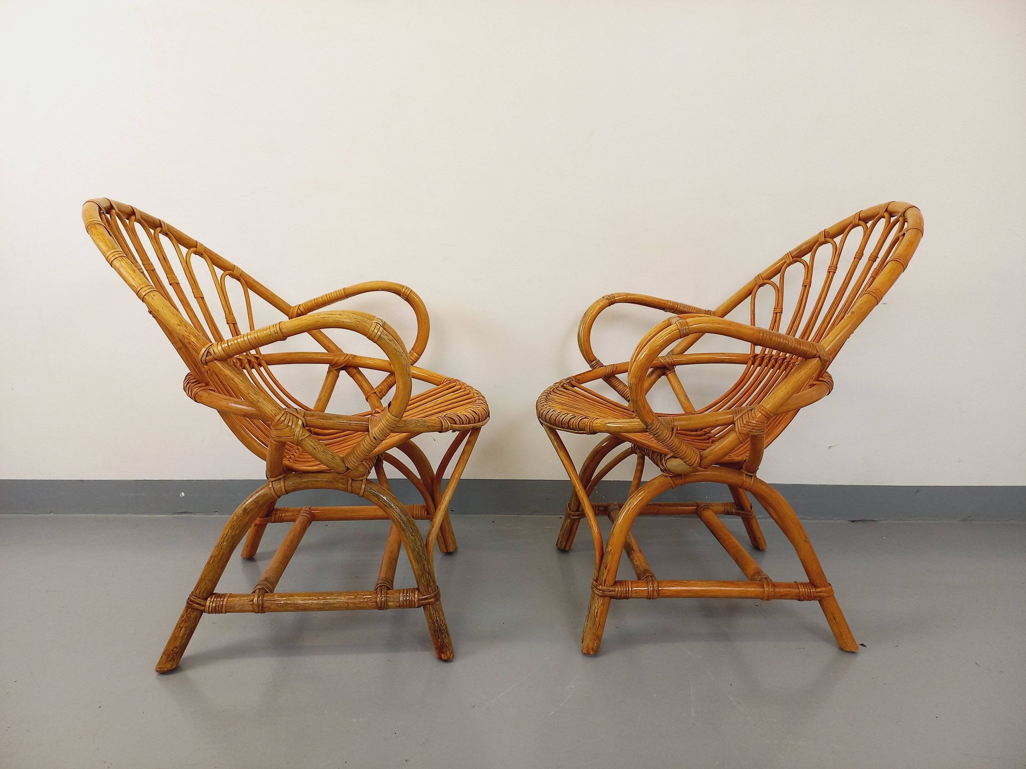 Pair of vintage rattan armchairs from the 60s