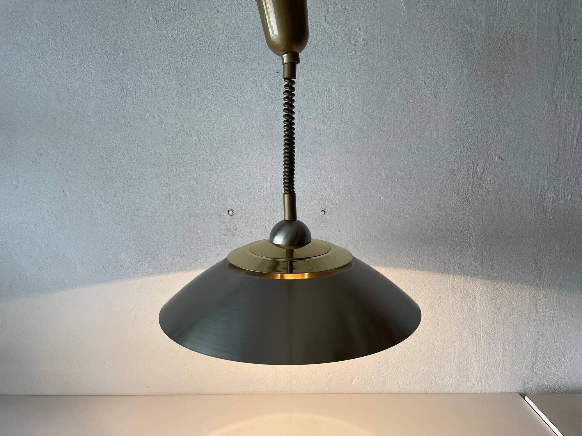 Suspended lamp in chrome and gold metal by TZ, 1970s, Germany.