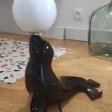 Vintage black sea lion lamp