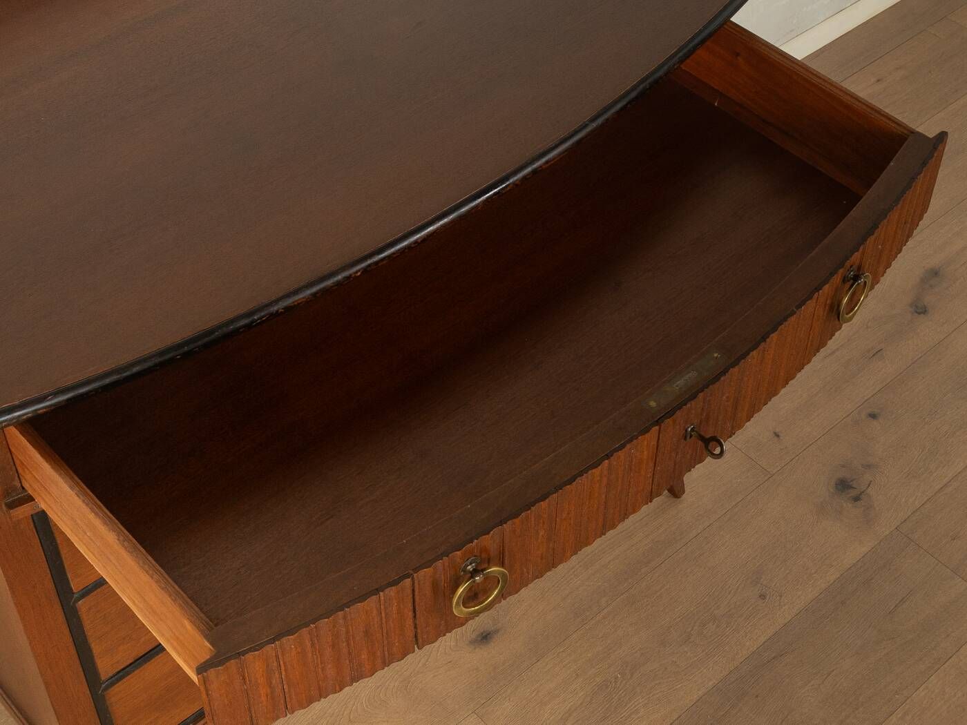 Classic chest of drawers from the 1920s in dark brown