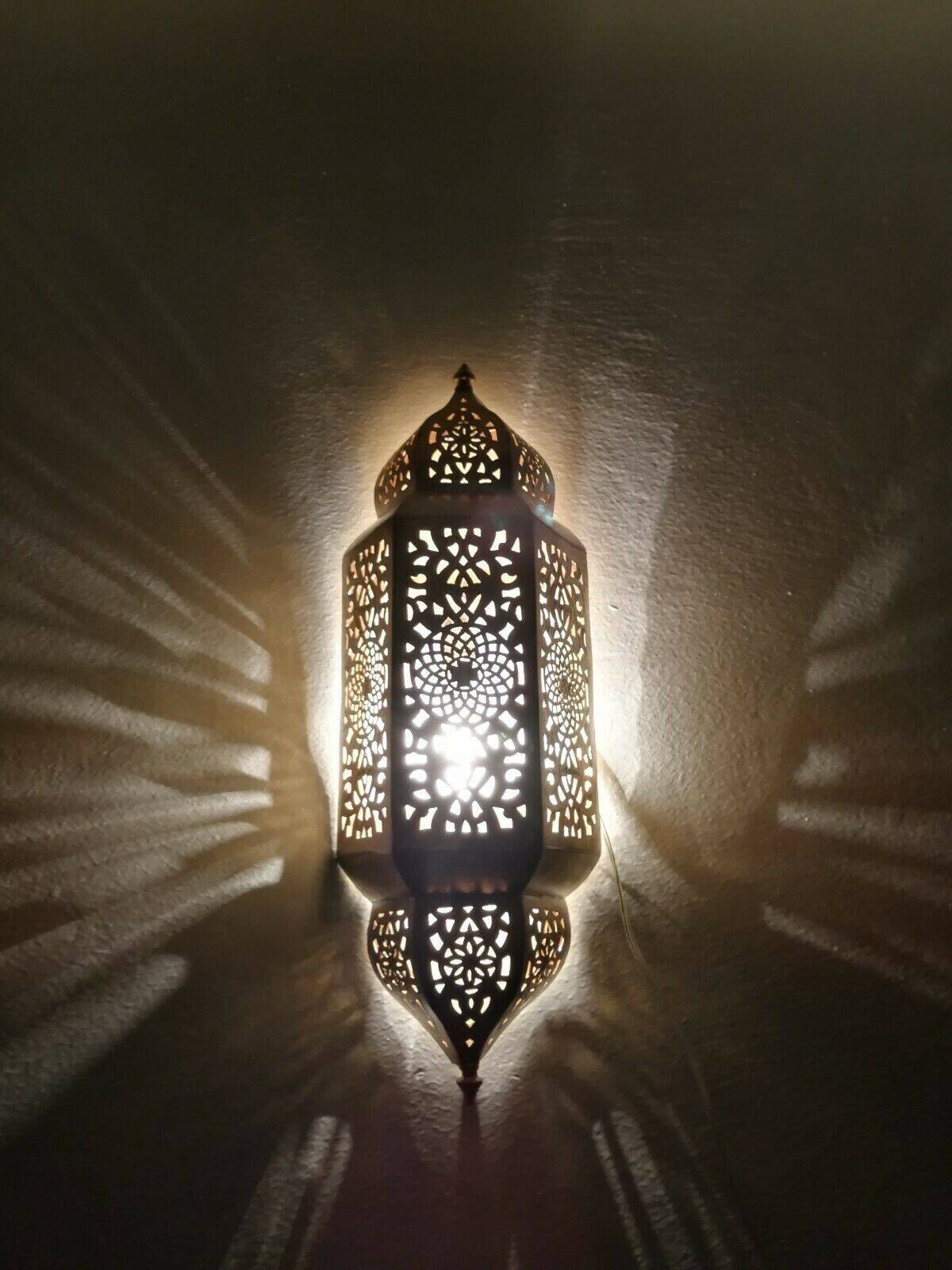 Moroccan brass wall lamp with an antique look