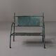 Fauteuil bas en fer forgé martelé, France, vers 1960