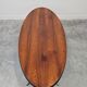 Danish Mid Century Modern oval coffee table with a teak top and chrome legs.