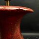 Lamp base in reconstituted stone, red "oxblood", 20th century