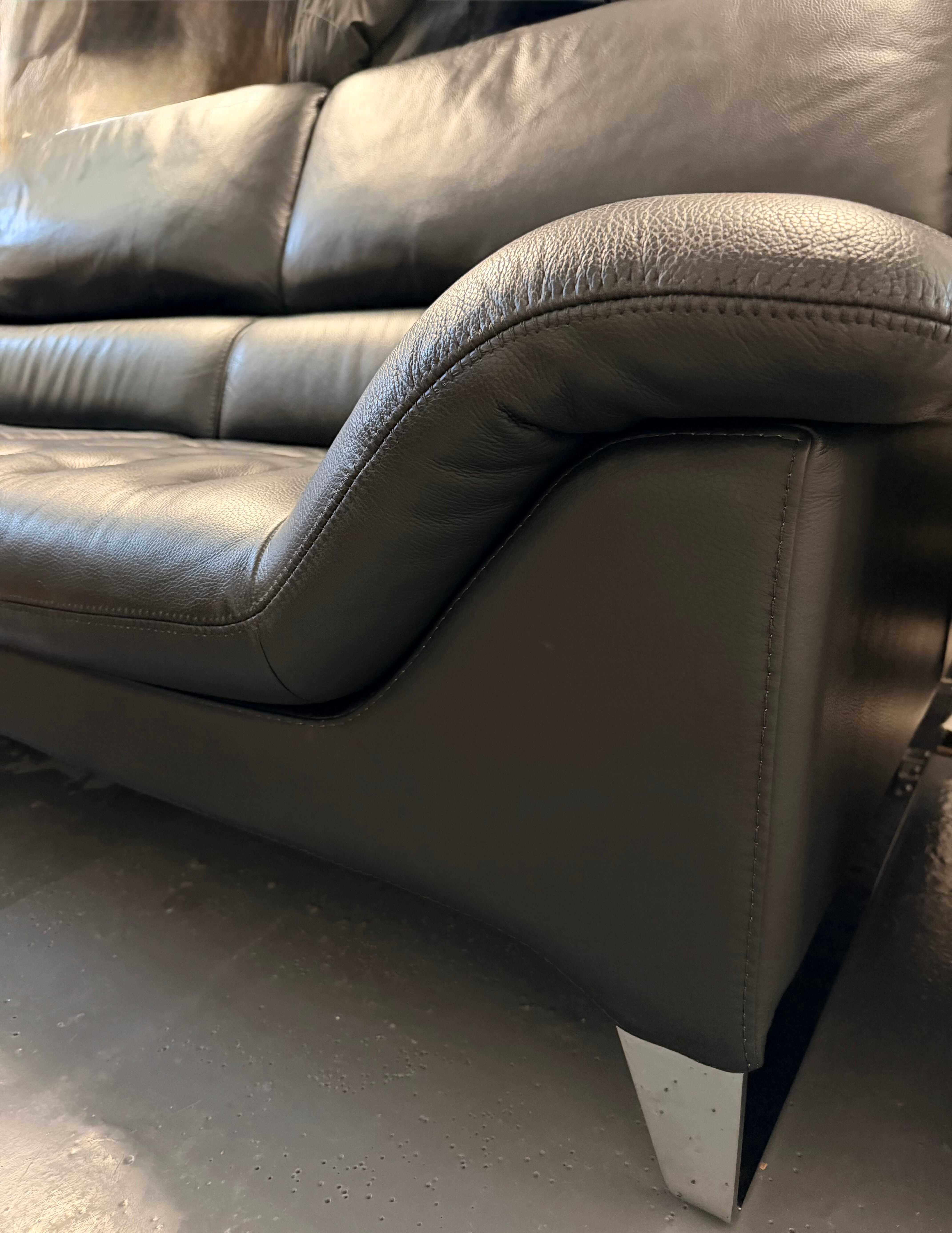 Two-seater black leather sofa Roche Bobois