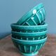 Emerald green glazed ceramic ribbed bowls