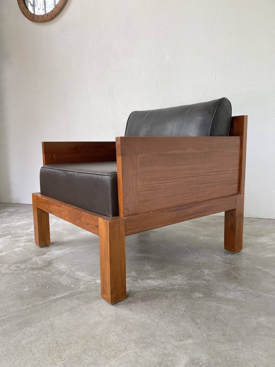 Modernist armchair in exotic wood and leather