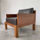 Modernist armchair in exotic wood and leather
