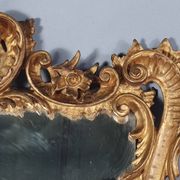 Mirror circa 1800, carved and gilded wooden frame, rocaille decoration, 54x39 cm, C227
